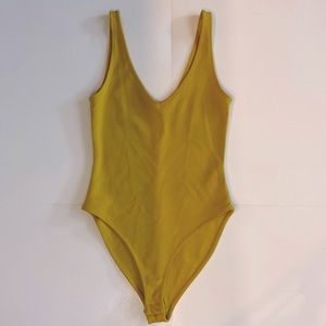 Mustard yellow/green tint size small body suit from Forever21